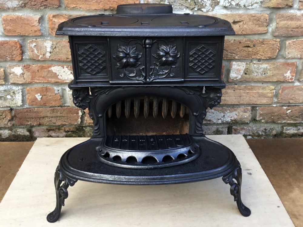 Pretty 19th Century Cast iron Stove View IV