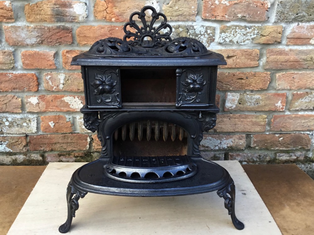 Pretty 19th Century Cast iron Stove View VI