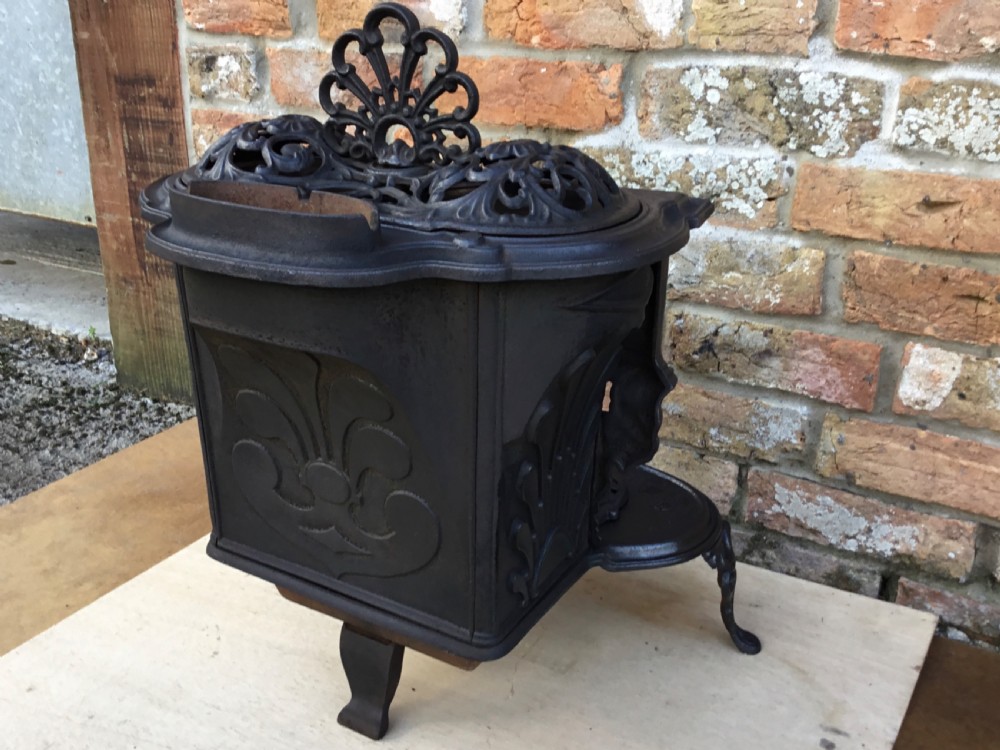 Pretty 19th Century Cast iron Stove View IX
