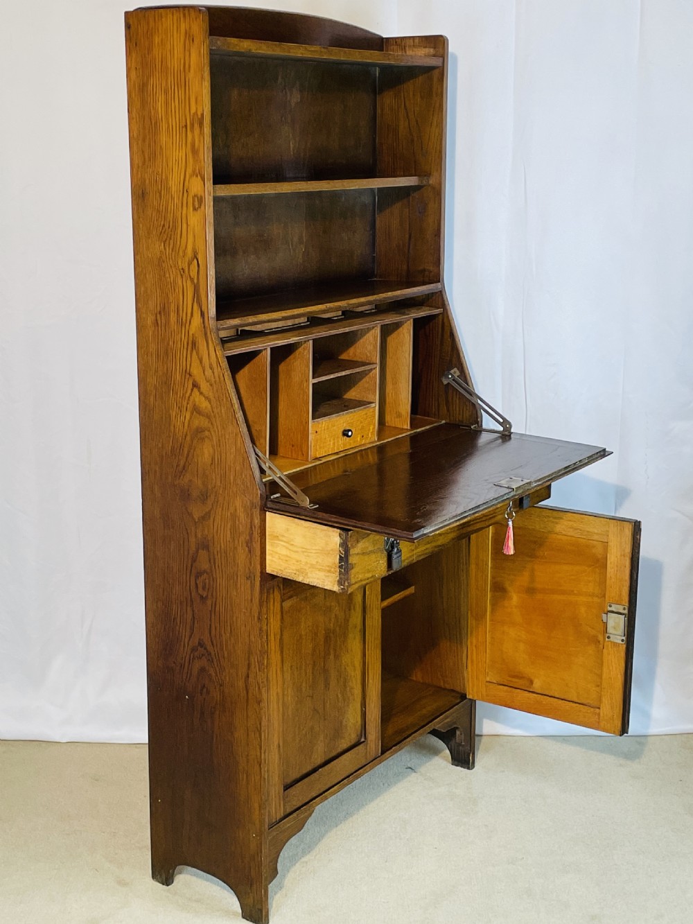 Slim 1920’s Honey Oak Bureau bookshelf Cabinet View IX