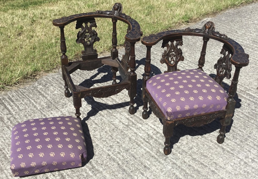 A Victorian dark mahogany coal purdonium featuring a sloped front hatch with brass corner plates, turned brass knob, and top brass bar handle. View IV