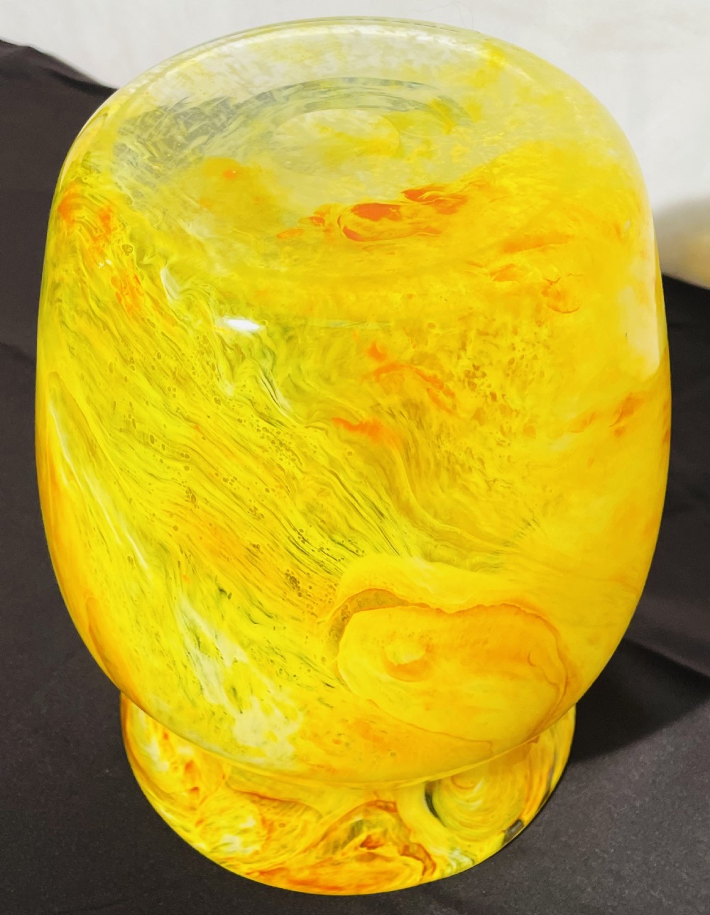 A flared 1930s Gray-Stan art glass vase featuring a swirling yellow and orange mottled pattern. View V