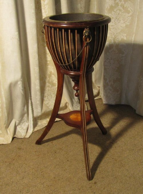 A Regency Style Inlaid Mahogany and Brass Jardinière, Wine Cooler Champagne Ice Bucket