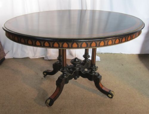A Large Regency Style Ebonised Inlaid Breakfast Table