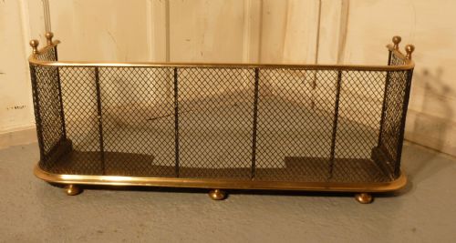 A Victorian Brass and Iron Club Fender