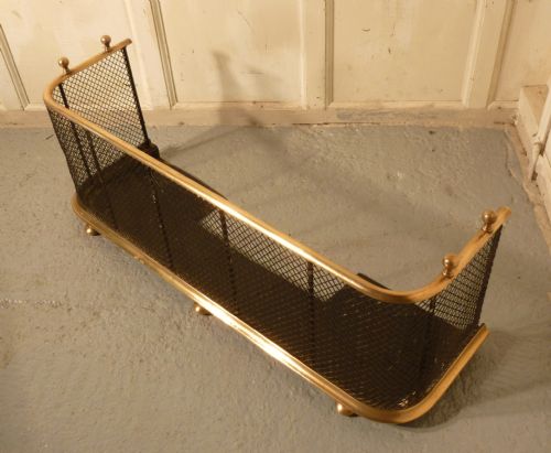 fig 2. A Victorian Brass and Iron Club Fender