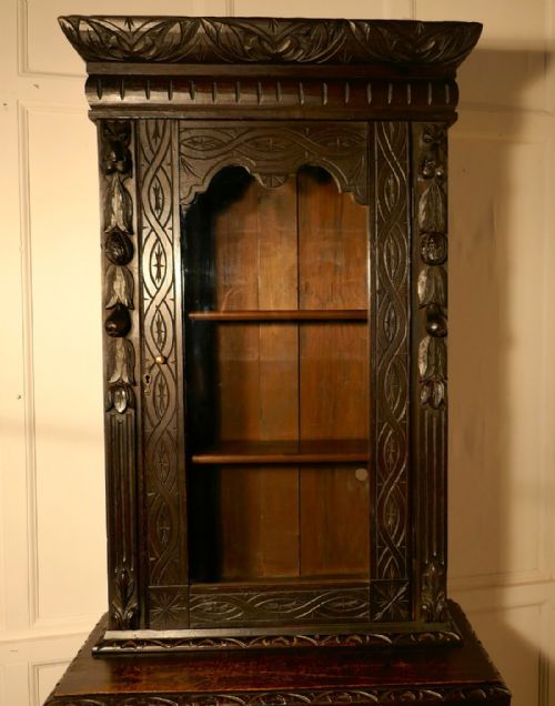 fig 1. Early Victorian Carved Gothic Oak Bookcase, Green Man Game Cupboard