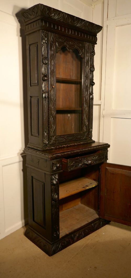 fig 4. Early Victorian Carved Gothic Oak Bookcase, Green Man Game Cupboard