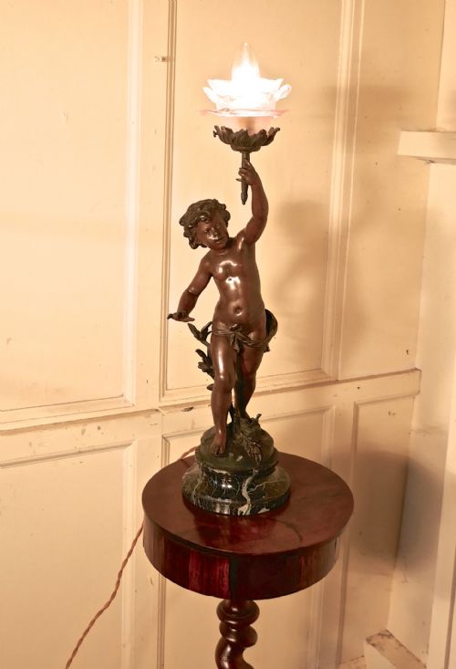 A Bronze Lamp of a Cherub or Putti After Ernest Justin Ferrand