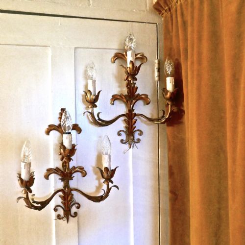 A Pair of French Three Branch Tole Ware Gilded Wall Lights
