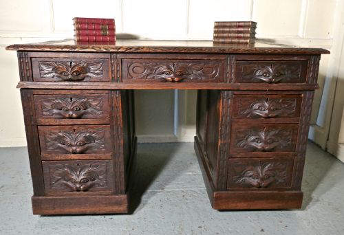fig 1. 19th Century Green Man Carved Oak Pedestal Desk