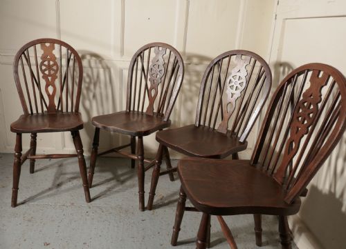 A Set of 4 Victorian Beech & Elm Wheel Back Windsor Kitchen Dining Chairs