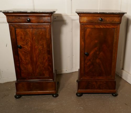fig 2. A Pair of Figured Mahogany Bedside Cupboards