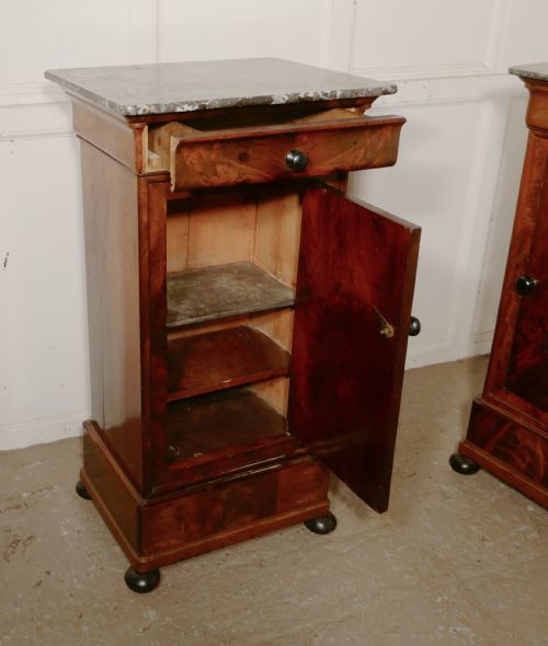 fig 4. A Pair of Figured Mahogany Bedside Cupboards