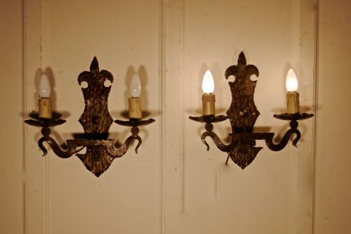A Superb Pair of French Arts and Crafts Gothic Iron Wall Lights
