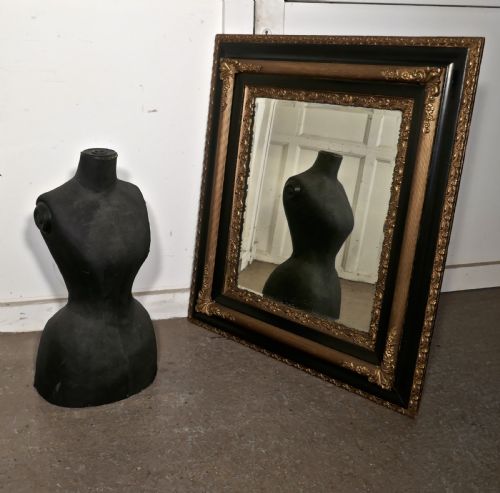 fig 3. A Large Victorian Gilt and Ebonised Wall Mirror