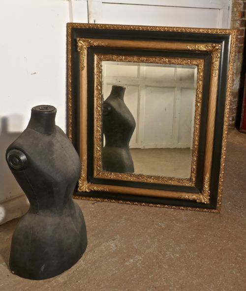 fig 4. A Large Victorian Gilt and Ebonised Wall Mirror