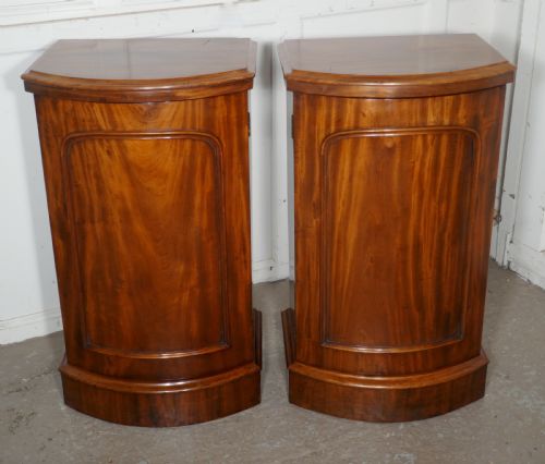A Pair of Victorian Flame Mahogany Pedestal Bedside Cabinets