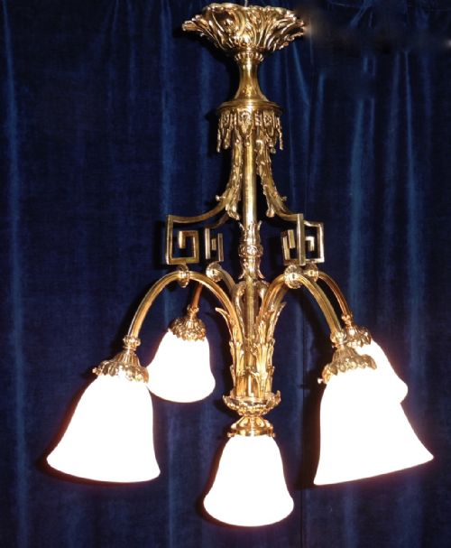 A French Gilded Brass Rococo Chandelier