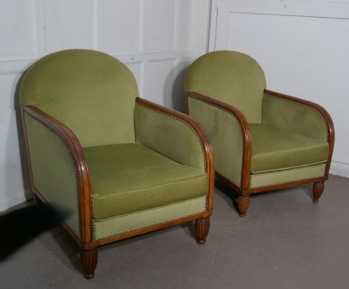 A Pair of French Art Deco Walnut Upholstered Club Chairs