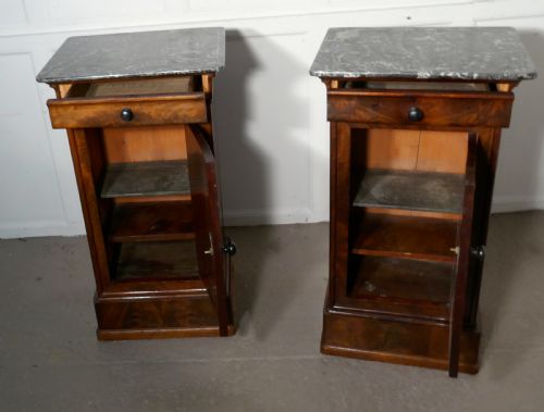 fig 3. A Pair of Figured Mahogany Bedside Cupboards