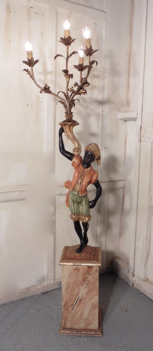 A Magnificent Venetian Blackamoor Candelabra