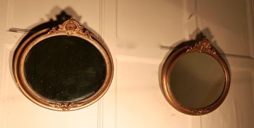 fig 3. A Rare Pair of 19th Century Regency Style Oval Gilt Mirrors
