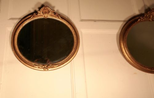 fig 4. A Rare Pair of 19th Century Regency Style Oval Gilt Mirrors