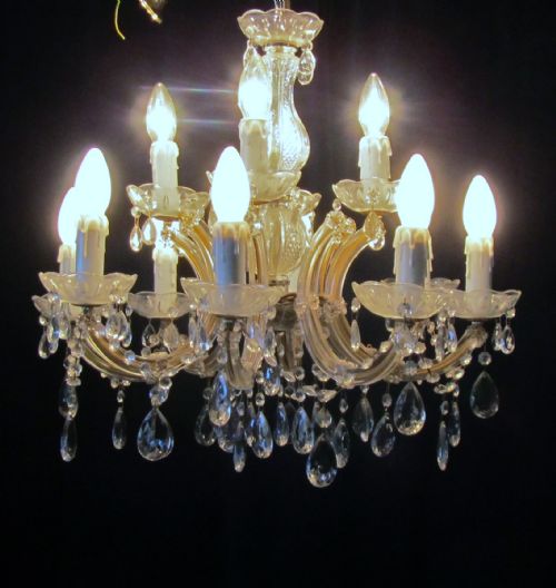 A Charming French Cut Glass and Brass 12 Lamp Chandelier