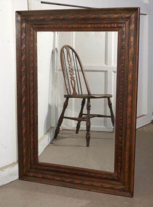 A 19th Century Carved Oak Mirror