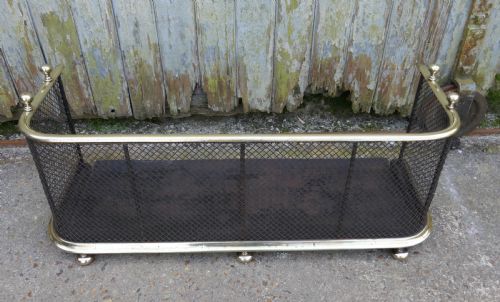 fig 3. A Victorian Brass and Iron Club Fender