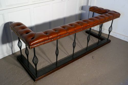 A Large Wrought Iron and Leather Club