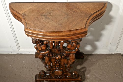 fig 4. A pair of 19th Century Ornately Carved Walnut Rocco Console Tables