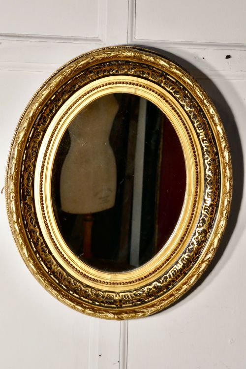 fig 3. Superb Deep Oval Frame French Empire Gilt and Lacquer Wall Mirror