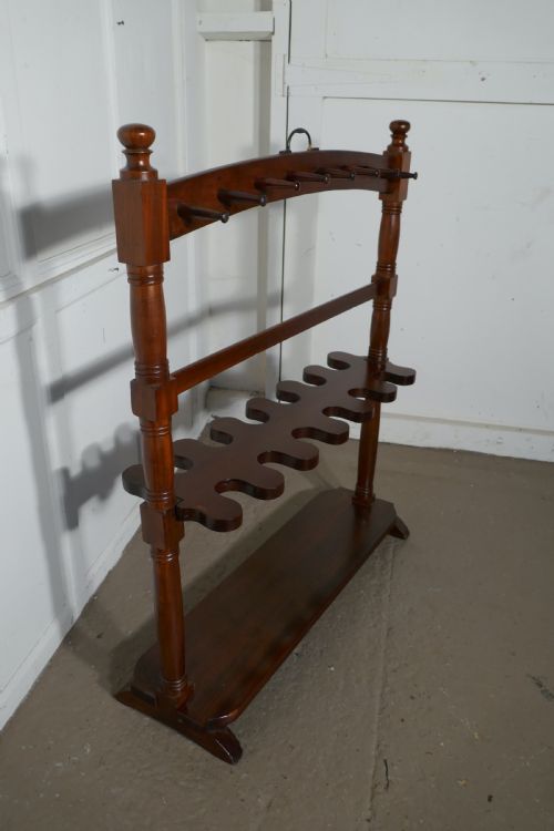 A Double Sided Georgian Mahogany Boot and Whip Rack.