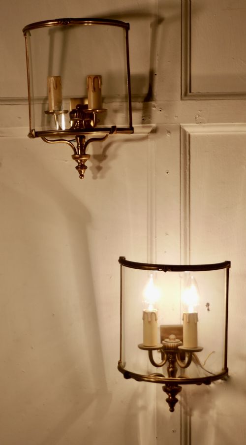 A Pair of French Twin Light Brass Convex Wall Lanterns