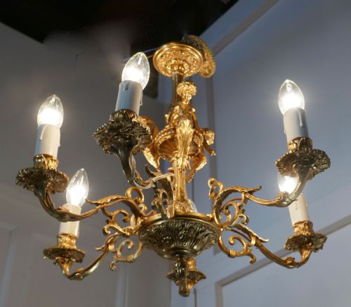 fig 3. A French Gilded Brass 6 Branch Rococo Cherub Chandelier