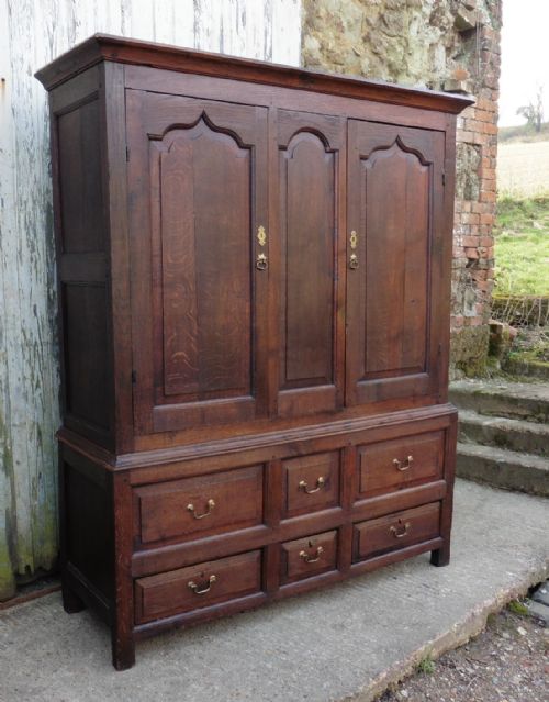 A 17th Century Oak Housekeepers or Cloakroom Cupboard