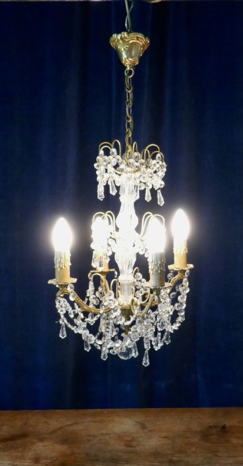 fig 1. A Stunning 4 Branch Chandelier by Lucien Gau Paris