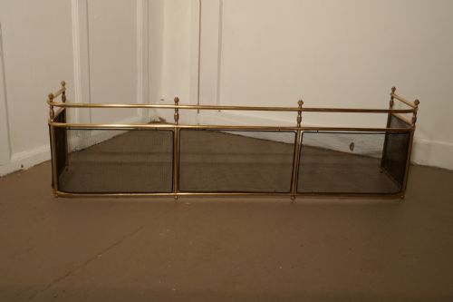 fig 2. A Large Victorian Brass Club Fender
