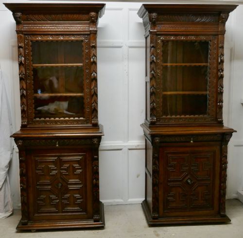 A Pair of French Carved Gothic Oak Bookcases