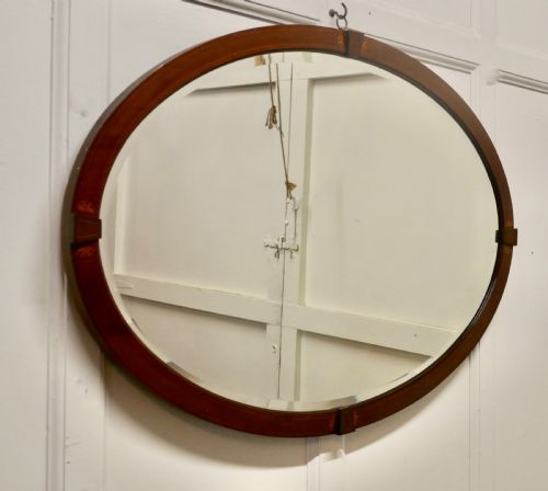 fig 1. A Large Edwardian Inlaid Mahogany Oval Mirror