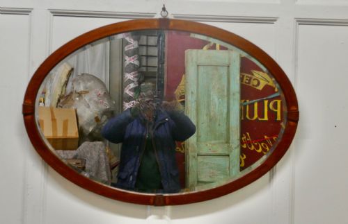 fig 2. A Large Edwardian Inlaid Mahogany Oval Mirror