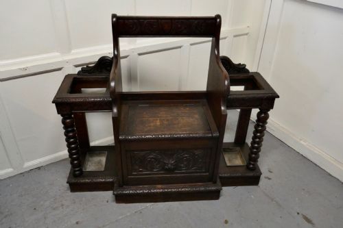 fig 1. Carved Oak Green Man Hall Settle, with Stick Stands