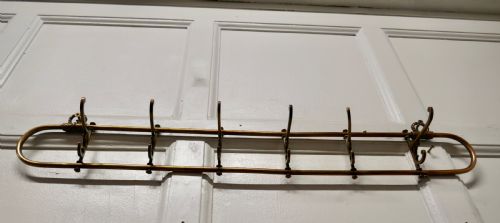 Nautical Brass Folding Coat Hook Rack from a Yacht