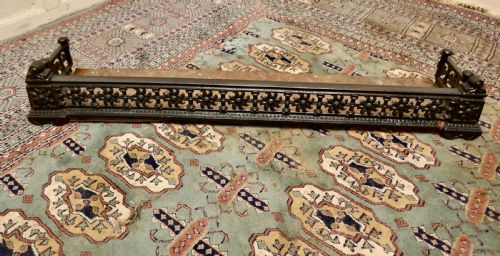 fig 1. Victorian Arts and Crafts Cast Iron Fender Decorated with Sun Flowers