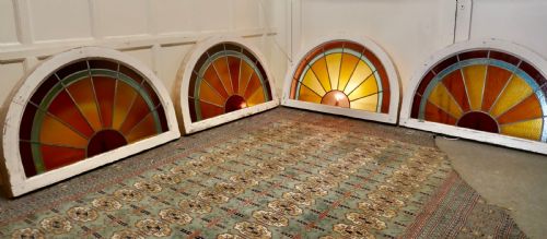 A Set of 4 Large Art Deco Arched Sunburst Stained Glass Windows