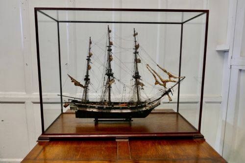 A Model of the French Ship Astrolabe in Display Case