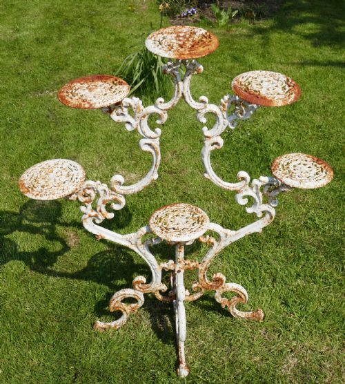 fig 1. Weathered Cast Iron 6 Branch Plant Stand.