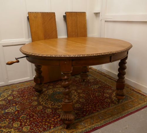 A Large Victorian  Golden Oak Oval Extending Dining Table